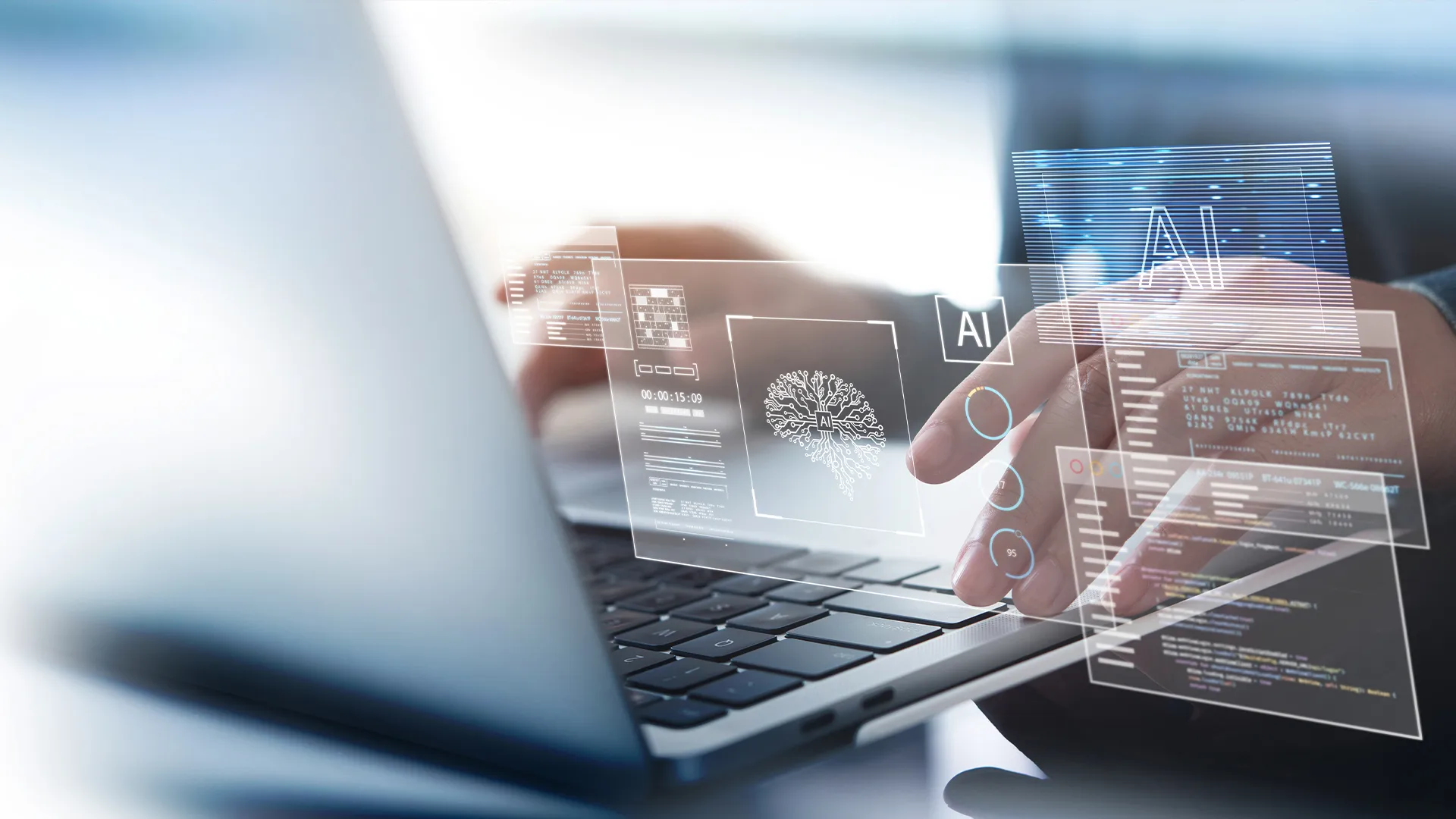 Hands typing on a laptop with digital overlays of AI graphics and data, conveying a futuristic, tech-driven environment focused on artificial intelligence.