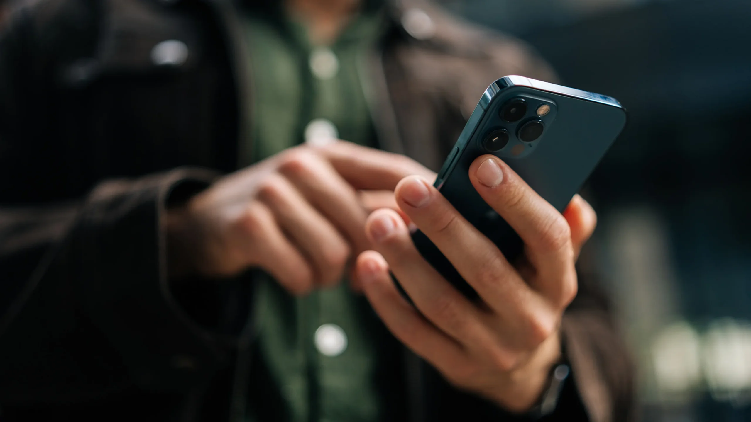 person holding a phone browsing social media